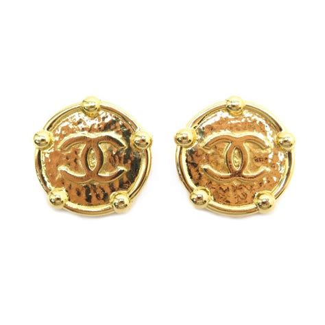 Chanel boucles doreilles à logo CC (1986.